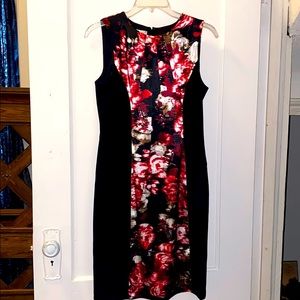 Black fitted business casual dress with flowers.